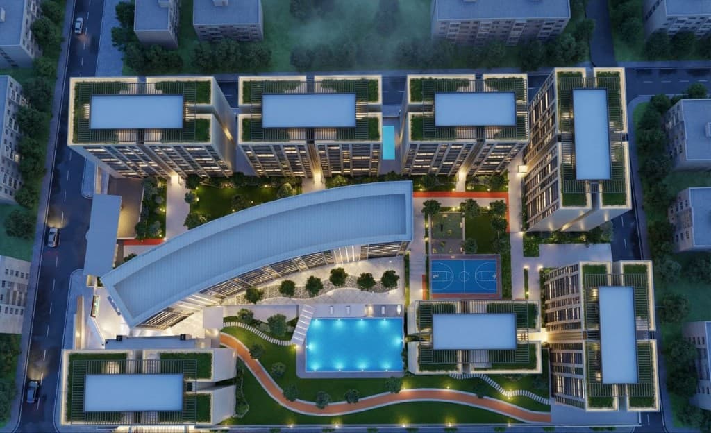 Night aerial of pool and landscaped grounds